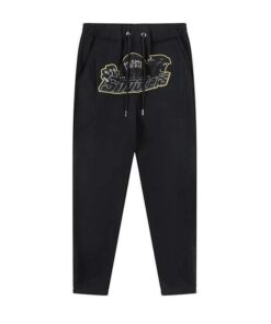 Pantalón Buzo TRAPSTAR Shooters Invierno "Negro/Amarillo" Bordado