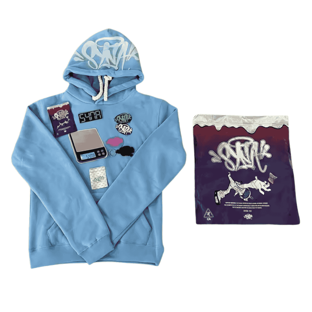 POLERON SYNA WORLD "Celeste" Algodón + BOLSA y STICKERS