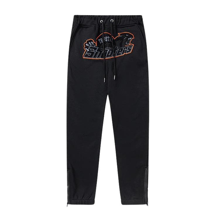Pantalón Buzo TRAPSTAR SHOOTERS "Negro/Naranja"
