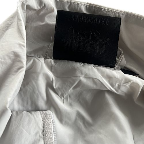 Conjunto SYNA WORLD CORTAVIENTO "Blanco/Gris" + BOLSA Y STICKERS - Imagen 3