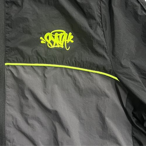 Conjunto SYNA WORLD CORTAVIENTO "Negro/Amarillo" + BOLSA Y STICKERS - Imagen 2